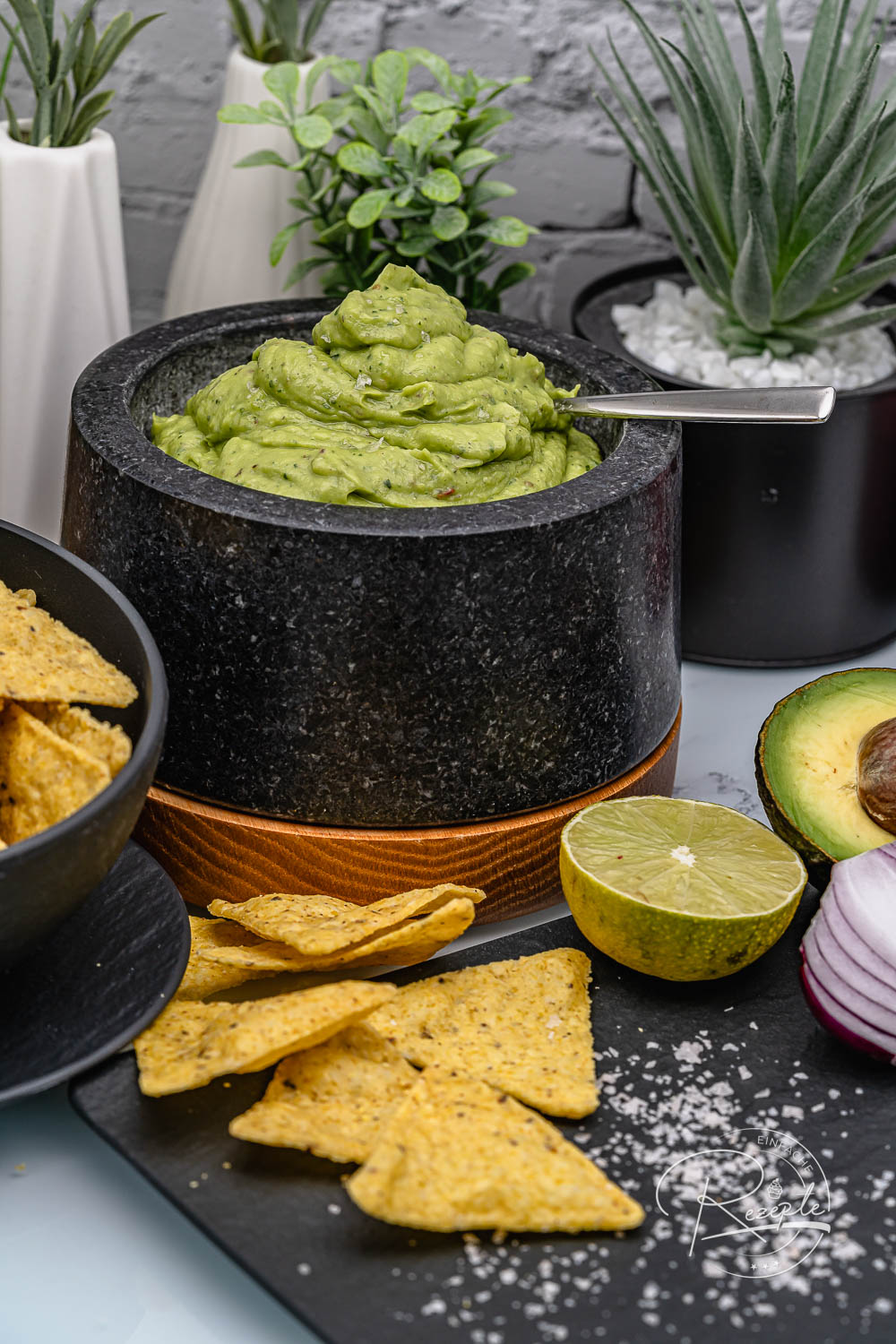 Creamy guacamole dip served fresh with tortilla chips
